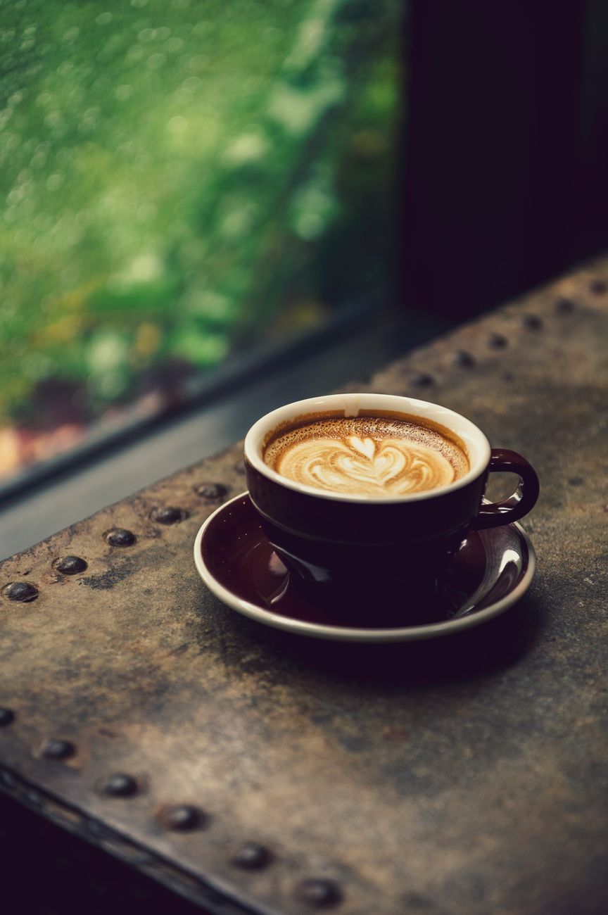 latte art in a cozy cafe setting